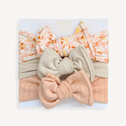 Set of baby headbands in packaging with a blurred background