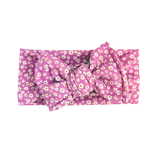 Floral patterned headband on a white background