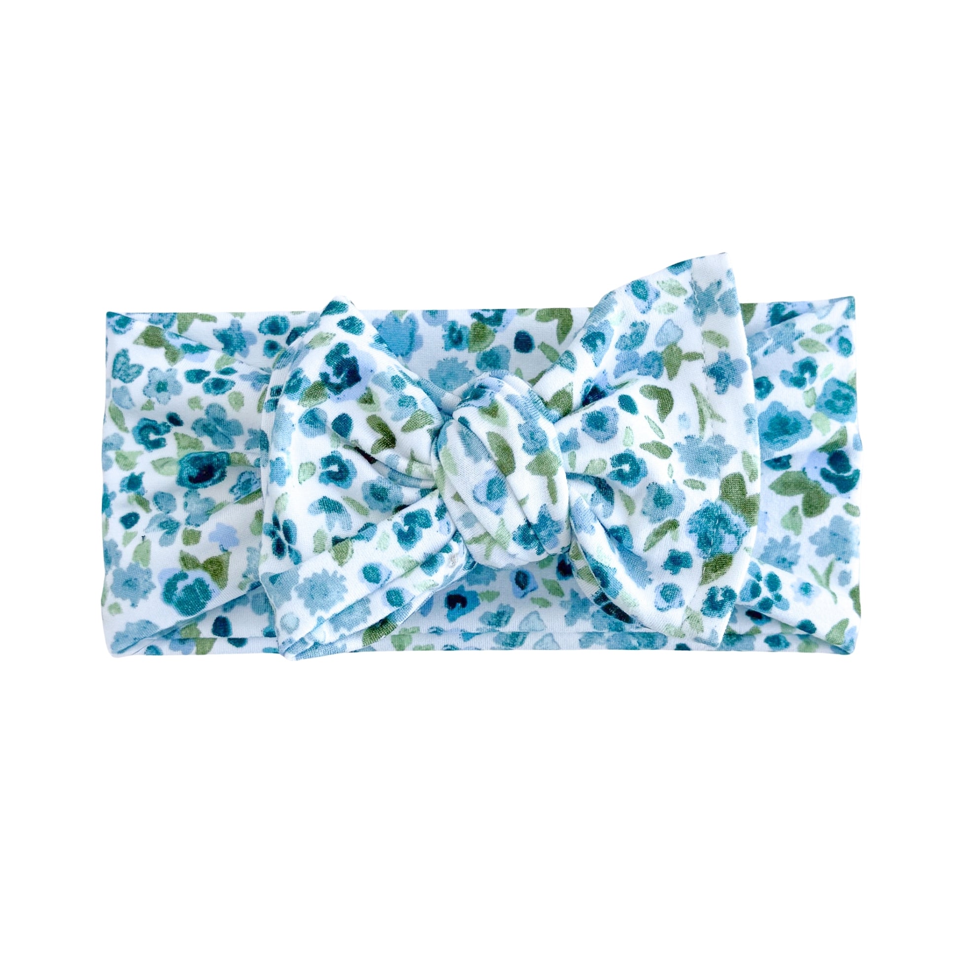 Oversized bow baby headband in blue watercolor floral, crafted from double brushed knit fabric, displayed on a white background