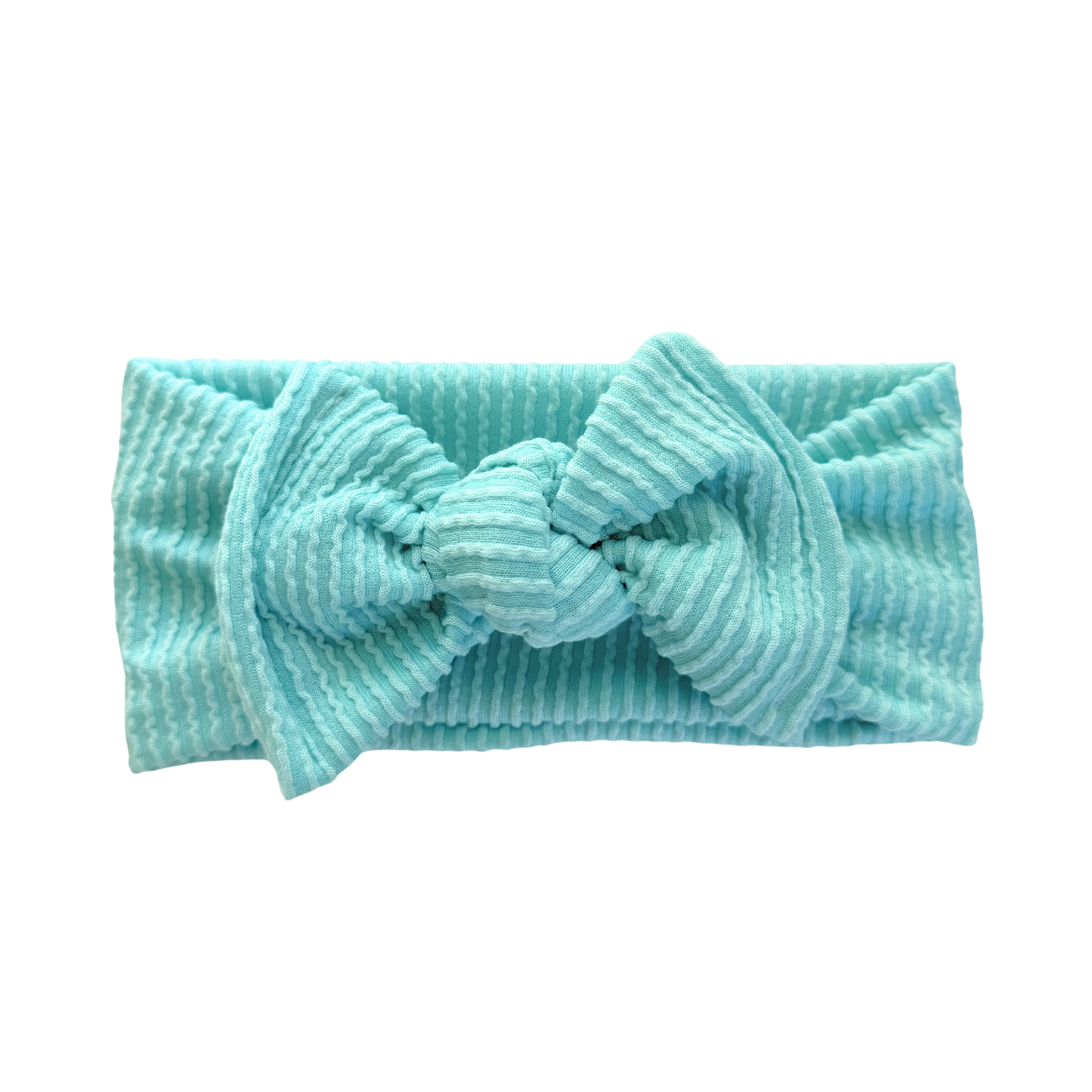 Turquoise knotted headband on a white background