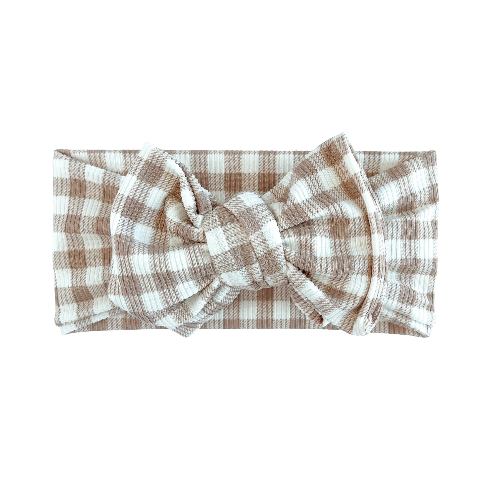 Oversized bow baby headband in taupe and white gingham print, crafted from ribbed knit fabric, displayed on a white background