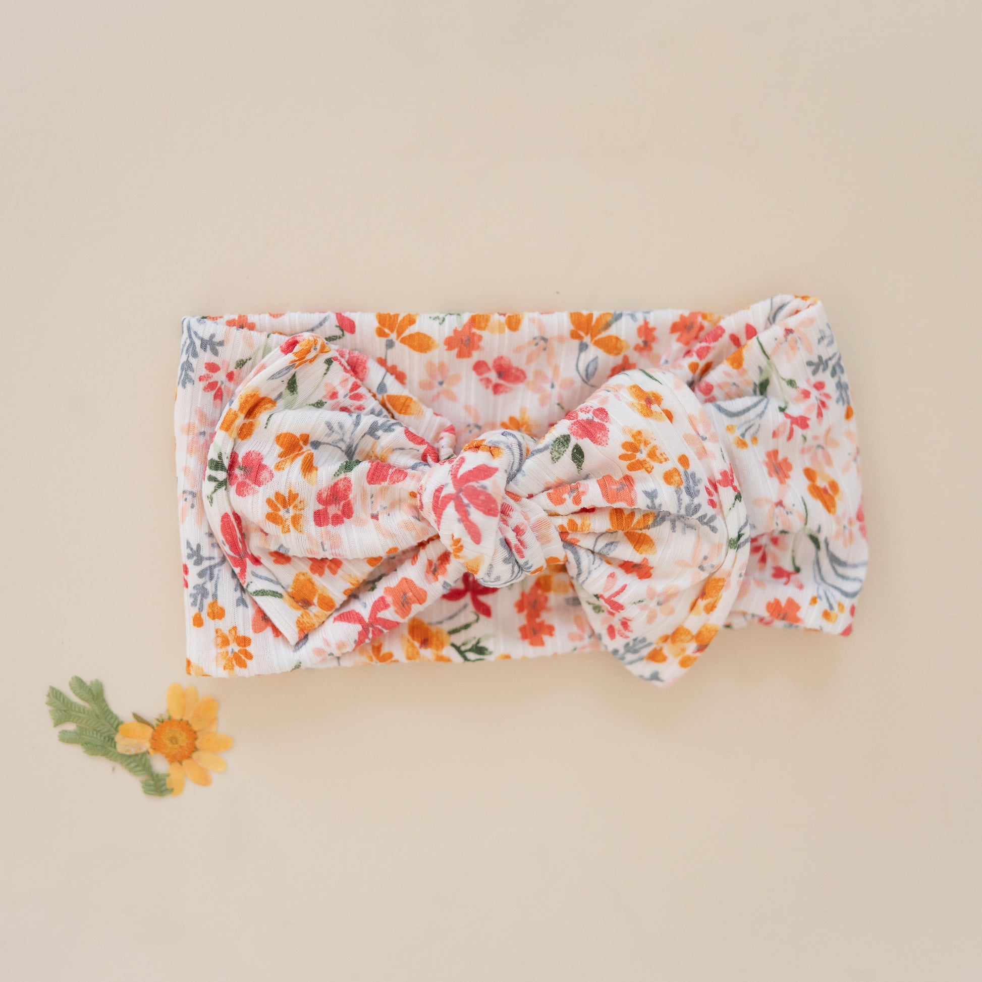 Floral headband on a beige background